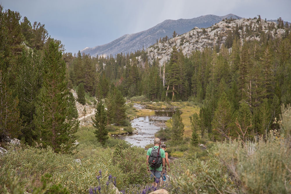 hiking in the mountains with river