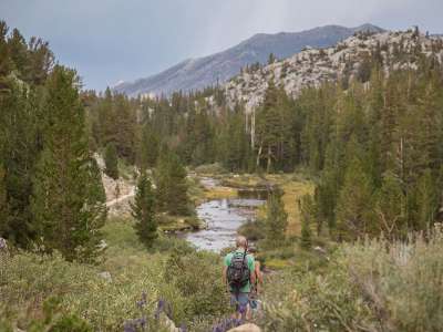 hiking in the mountains with river