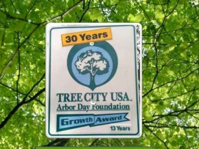 Metal Tree City USA sign